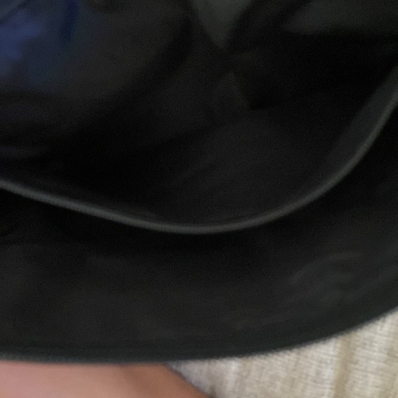 It’s a H and M bag black leather with gold points at the end and it’s spacious - Picture 5 of 7